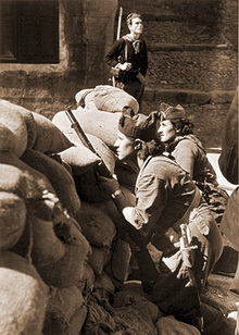 Militiawomen Guarding a Barricade Across a Street